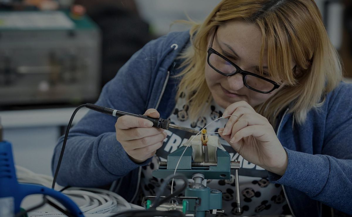 A Rega employee working in the CNC Wiring department