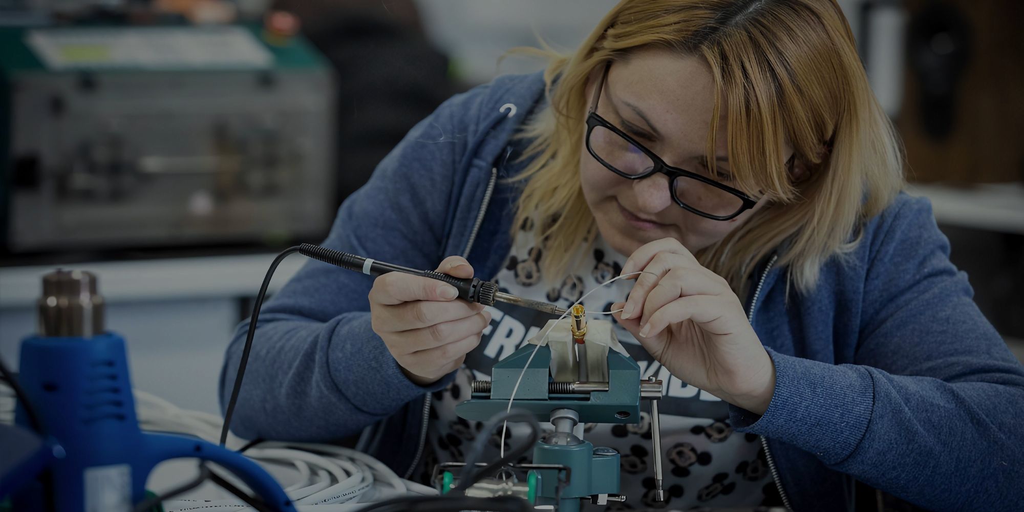 A Rega employee working in the CNC Wiring department