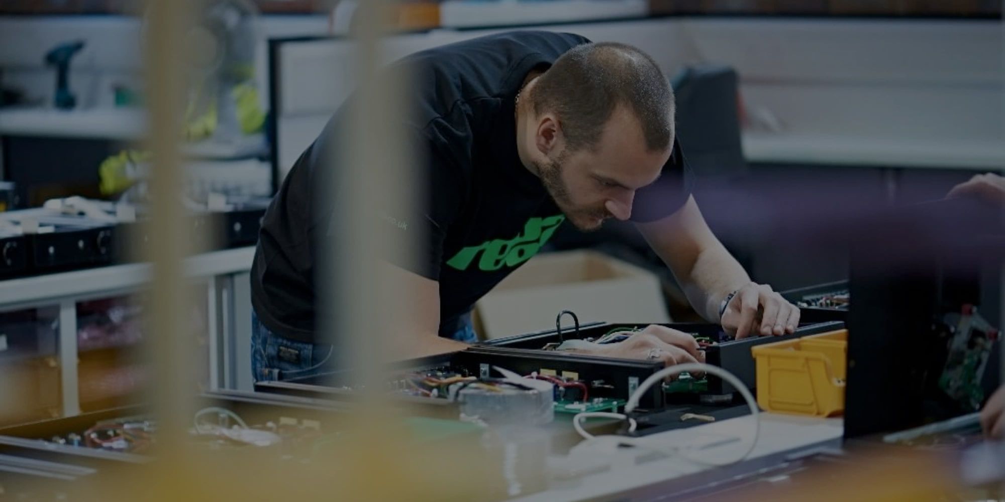 A Rega employee hard at work in the factory.