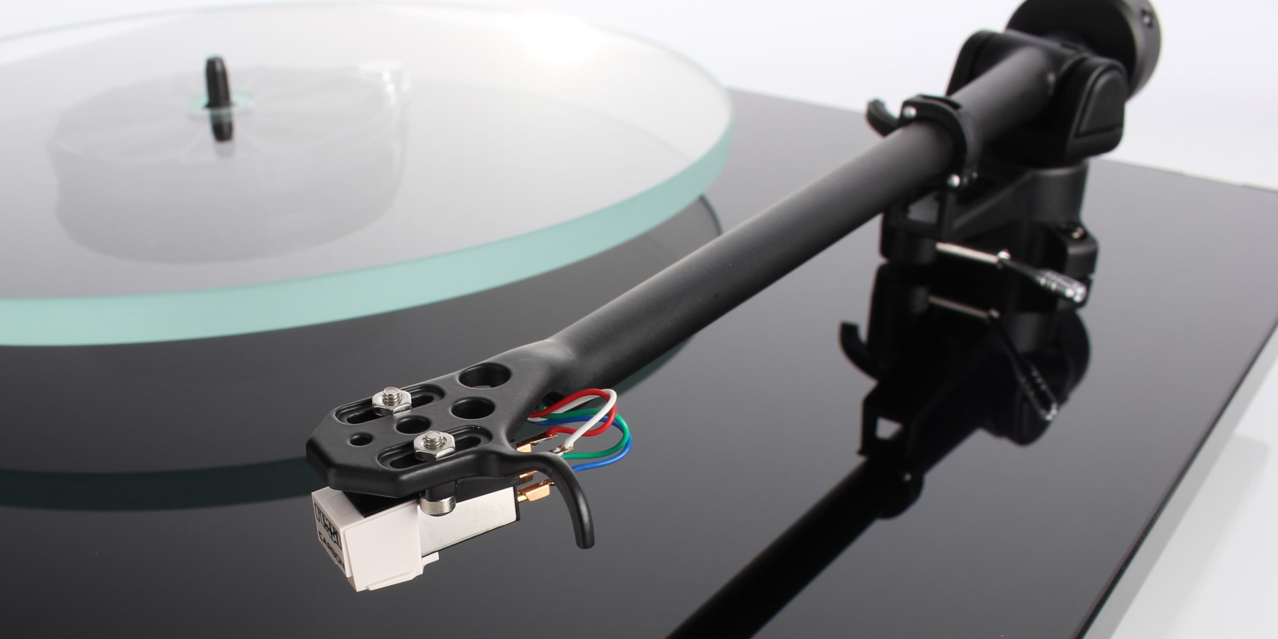 Rega RB220 precision crafted tonearm with extremely low friction levels